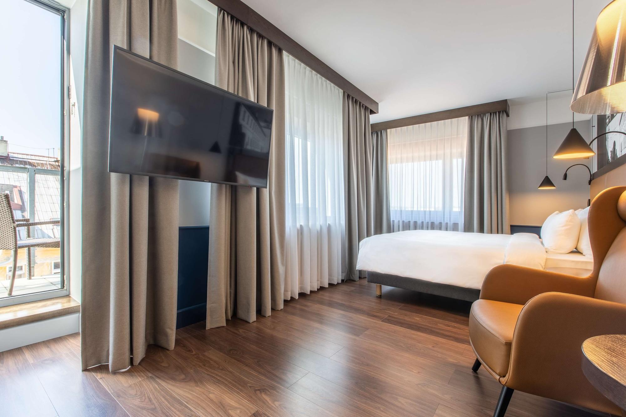 Radisson Blu Hotel Praga Esterno foto A room at the hotel