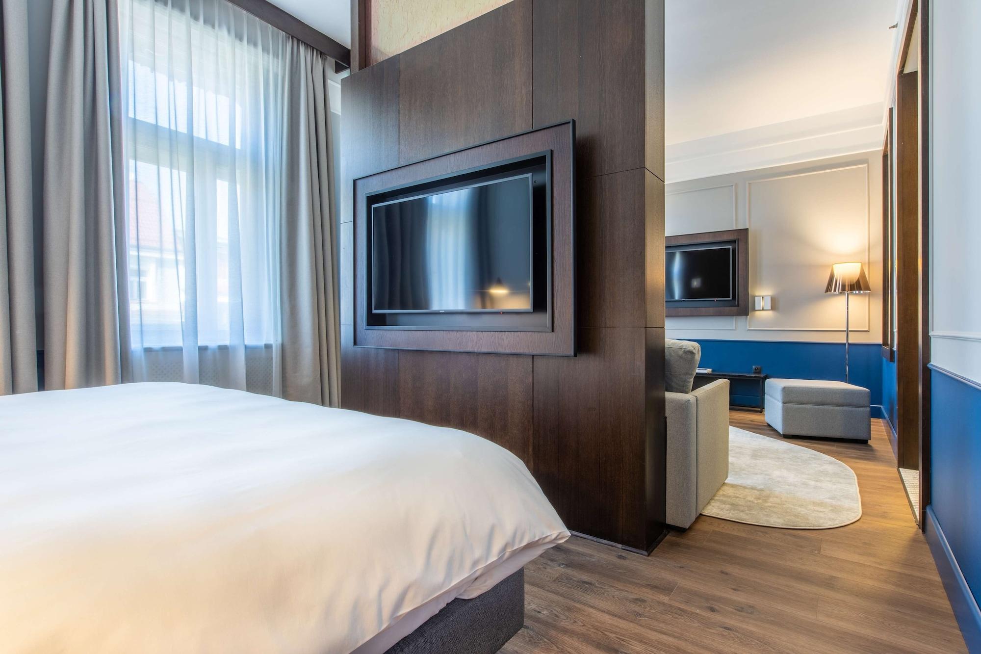 Radisson Blu Hotel Praga Esterno foto A room at the hotel